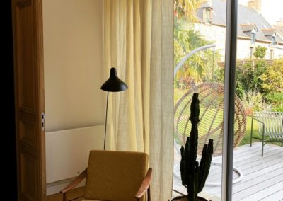 Pose de tringlerie et de rideaux chez le client Signé Bisson Bruneel